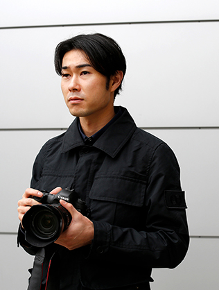 about YOSHINORI MIZUTANI